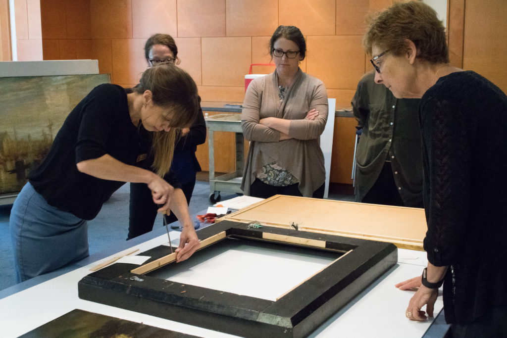Paintings Conservator, Rita Berg, instructing at a MACC Care of Paintings workshop.
