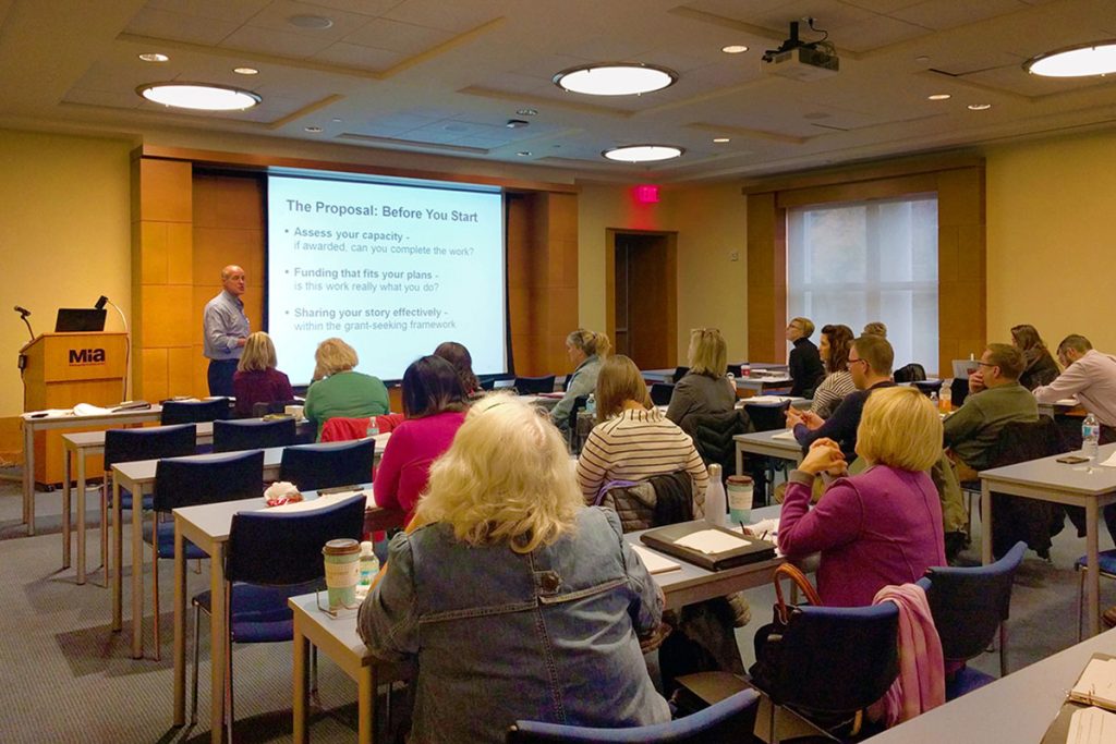 Executive Director, Colin Turner, teaching at a MACC Grant Writing seminar.