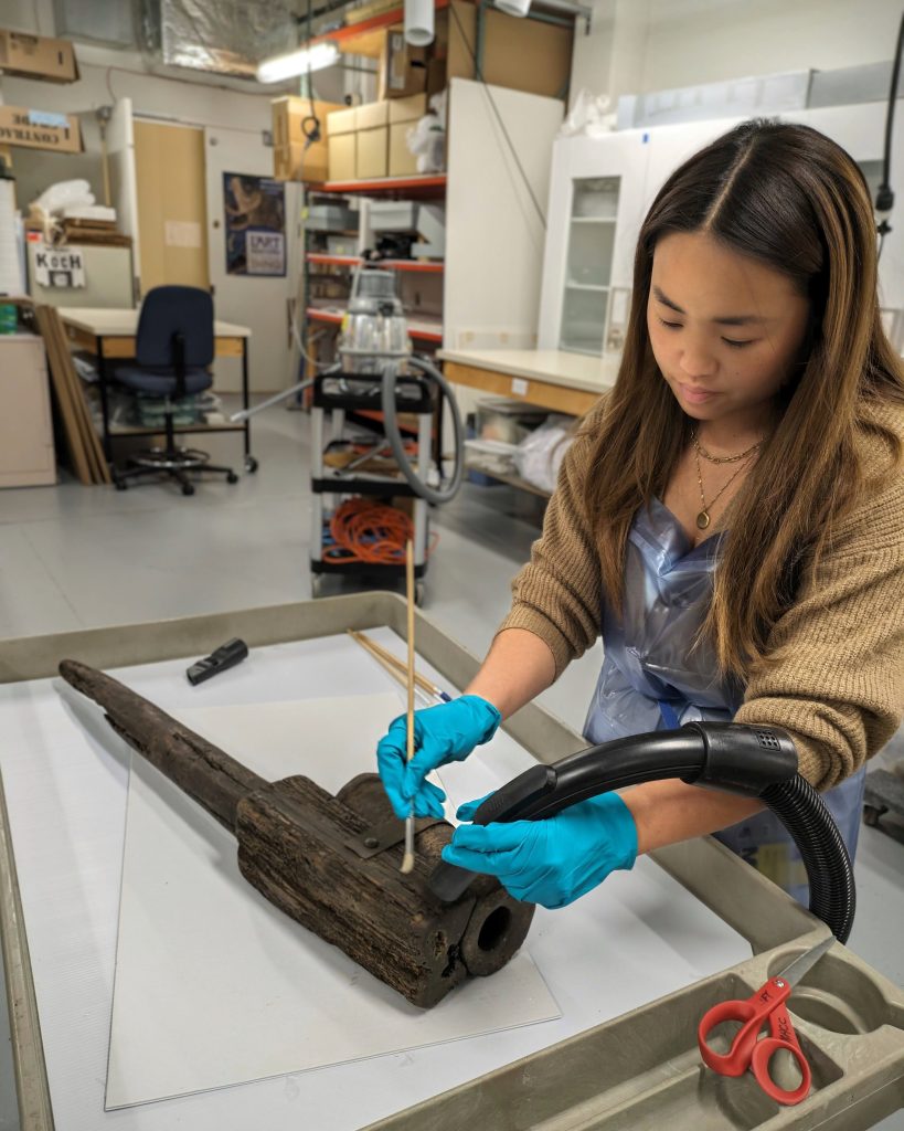 Mellon Fellow, Olivia Thanadabout, working in the Objects lab.